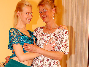 Two blonde old and young lesbians have fun