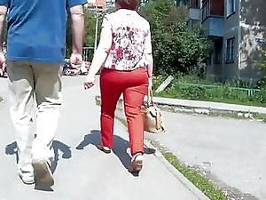 Follow big ass milf in red pants