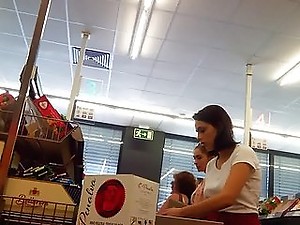 Beautiful brunette in red shorts